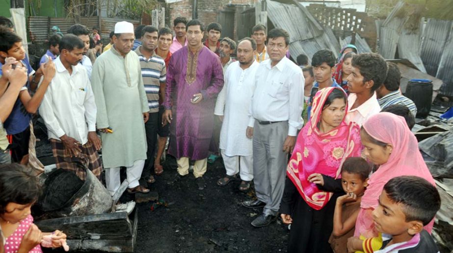 Acting CCC Mayor Nisar Uddin Ahmed Monju visiting fire damaged area at Jafar Kha Para in the city on Tuesday.