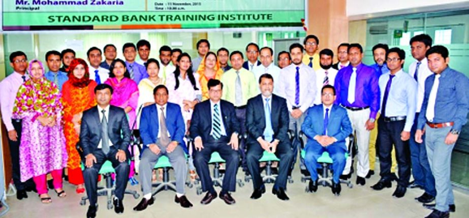 Md. Nazmus Salehin, Managing Director and Mamun-Ur-Rashid, Deputy Managing Director of Standard Bank Ltd. pose at a daylong workshop on "Money Laundering Prevention and Combating Financing Terrorism" organized by the Training Institute of the Bank.