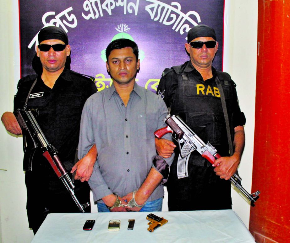 RAB-2 team arrested a man from Sher-e-Bangla Nagar area in the capital on Wednesday and also seized arms, magazine and mobile sets from his possession.