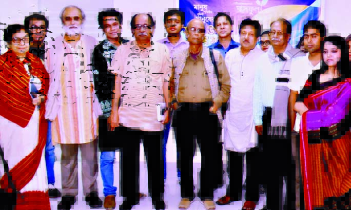Poet Syed Shamsul Huq along with other poets at a programme of self-composed poems titled 'Sabar Upare Manush Satya' organized by Ghasful, a media house at the premises of Kagoj Prokashani in the city on Wednesday.