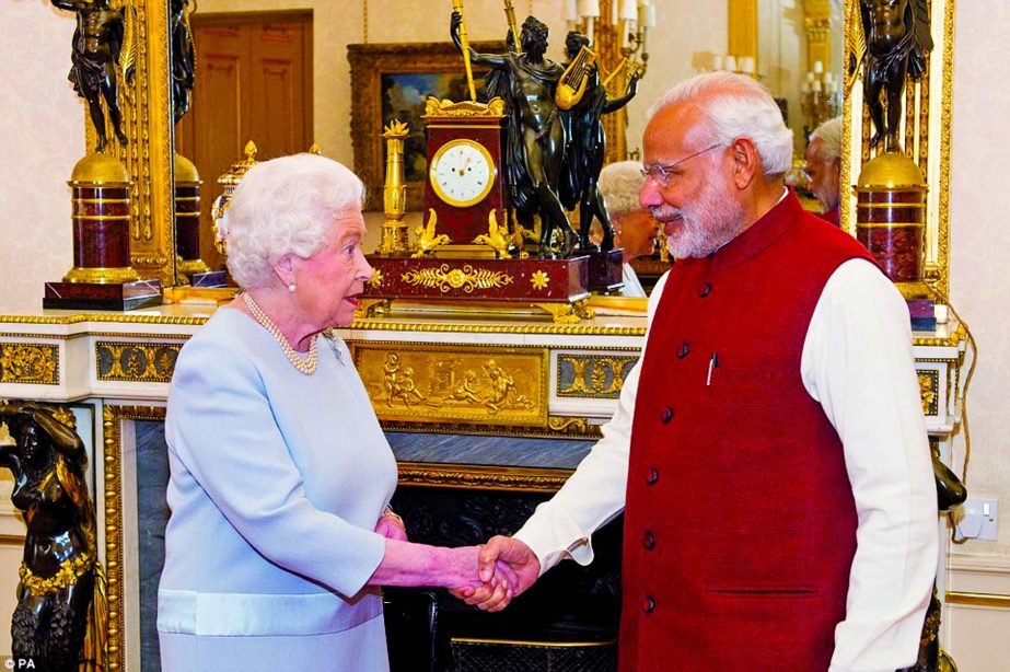 Indian Prime Minister Narendra Modi shaking hands with Queen Elizabeth at Buckingham Palace during his visit to Britain on Thursday.