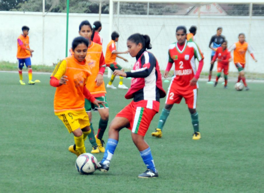 Players of Bangladesh National Women's Football team during their practice session at the BFF Artificial Turf on Saturday.