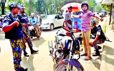 Joint forces continue the checking and searching operations as part of strict security programme. This photo was taken from city's Baridhara Diplomatic Zone area on Saturday.