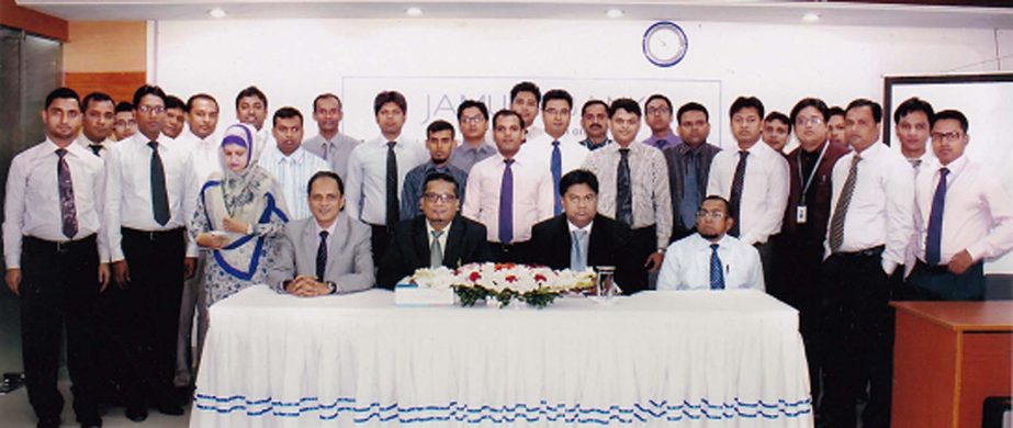 Mosleh Uddin Ahmed, Additional Managing Director of Jamuna Bank Limited poses with the participants of a three day-long Training Program on "International Trade & Foreign Exchange Operation" at Surma Tower, Purana Paltan, Dhaka on Sunday.