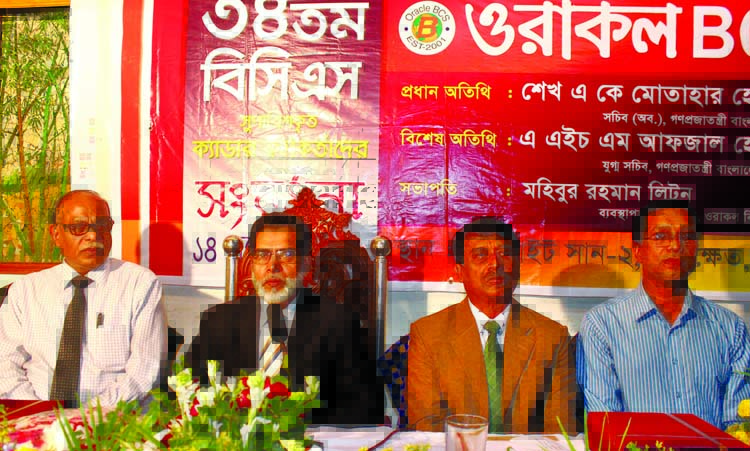 Former Secretary Sheikh A K Motahar Hossain speaking at a reception accorded to the 34th BCS at a local hotel in the city on Sunday.