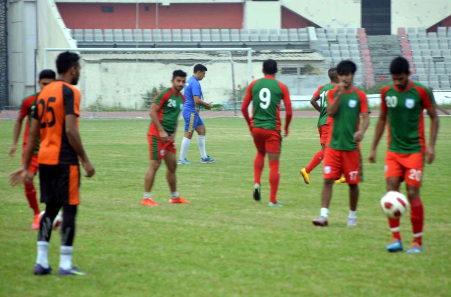 Players of Bangladesh National Football team during a practice session at the Bangabandhu National Stadium on Sunday.