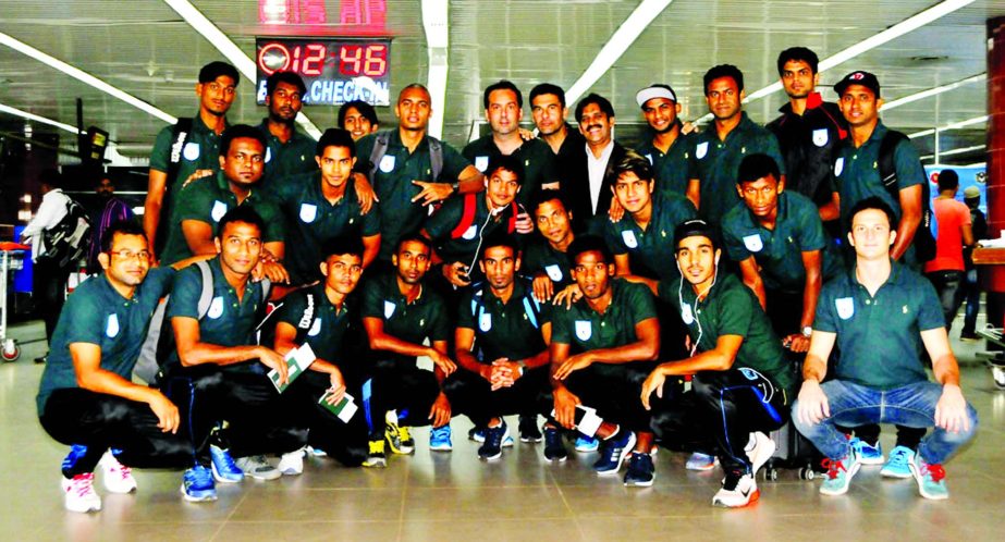 Members of Bangladesh National Football team pose for a photo session at the Hazrat Shahjalal International Airport on Wednesday before leaving the city for China to take part in the upcoming Yunnan ASEAN International Football Tournament scheduled to be