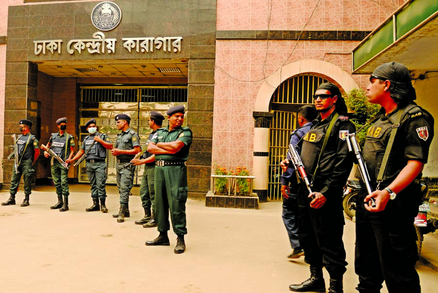 Law enforcers stand guard at Dhaka Central Jail on Wednesday as the court upholds the death sentence against Jamaat leader Ali Ahsan Mohammad Mojahid and BNP leader Salauddin Quader Chowdhury for their crimes against humanity.