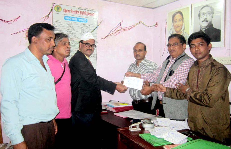 President of CRU Foundation Ltd Mohd Nazrul Islam distributing pass books among the members of the Foundation at a function yesterday.