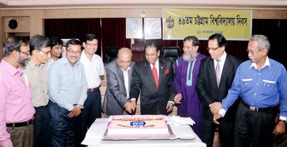 CU Vice Chancellor Prof Dr Iftekhar Uddin Chowdhury along with other teachers inaugurating 49th anniversary programme of CU by cutting cake yesterday morning.