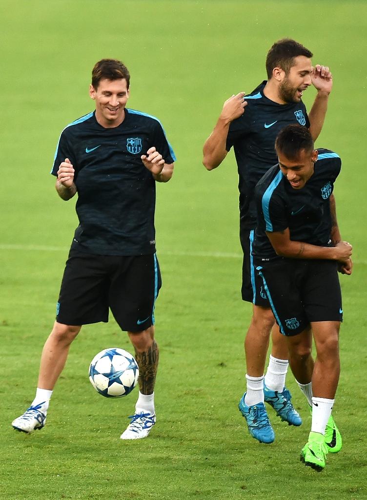 File photo: Messi, Neymar and defender Jordi Alba during a training session.