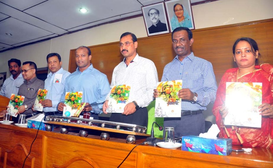 CCC Mayor AJM Nasir Uddin unwrapping cover of magazine Tirtho Darshon at a function in the city yesterday.