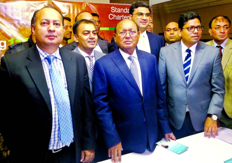 Commerce Minister Tofail Ahmed, State Minister for ICT, Zunaid Ahmed Palak, Head of Retail Baking of SCB Aditya Mandloi and Head of Brand and Marketing Mahiul Islam visiting Standard Chartered Bank's stall in the 2nd UK-Bangladesh E-Commerce Fair in Lond