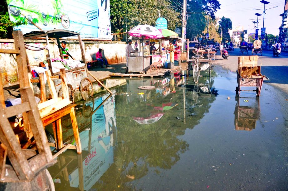 A major portion of the main thoroughfare at Naya Paltan area being logged with dirty and sewage water due to poor drainage system creating obstacles to commuters and pedestrians but the authorities concern seem to be indifferent. This photo was taken on F