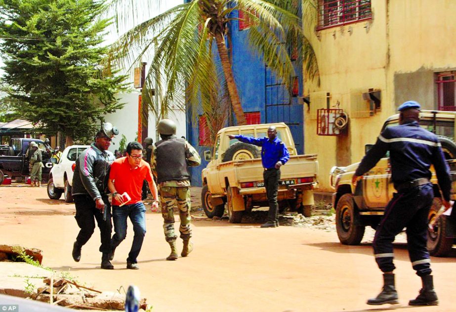 Dozens of hostages remain trapped inside the hotel in Maliâ€™s capital despite news that special forces have entered the building.