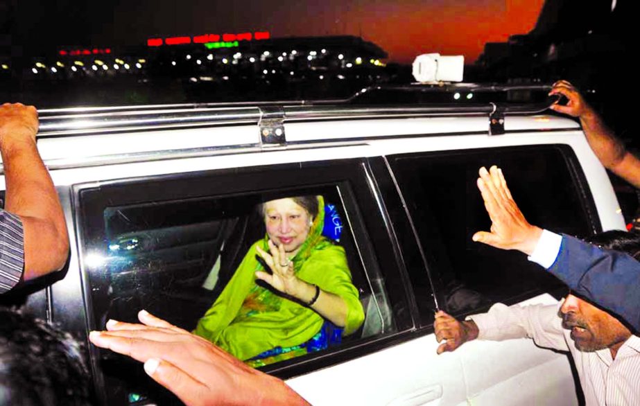 BNP Chairperson Begum Khaleda Zia waiving the party supporters gathered near the Hazrat Shahjalal International Airport (HSIA) after returning from London on Saturday.