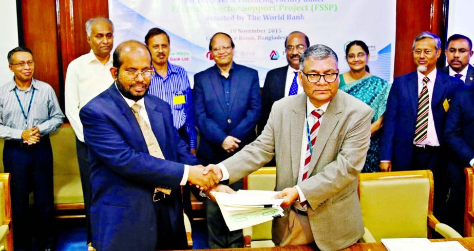 Md Habibur Rahman, Managing Director of Al-Arafah Islami Bank and Md Ahsan Ullah, Executive Director of Bangladesh Bank sign an agreement of long-term financial fund from BB at BB head office recently.