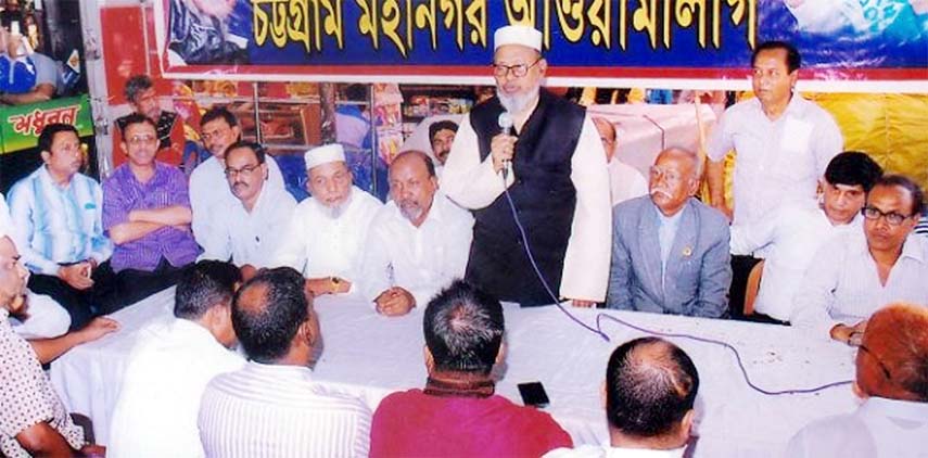 Chittagong City Awami League President and former city mayor Alhaj ABM Mohiuddin Chowdhury addressing the anti-hartal rally at Darul Fazal Market Office premises on Monday.