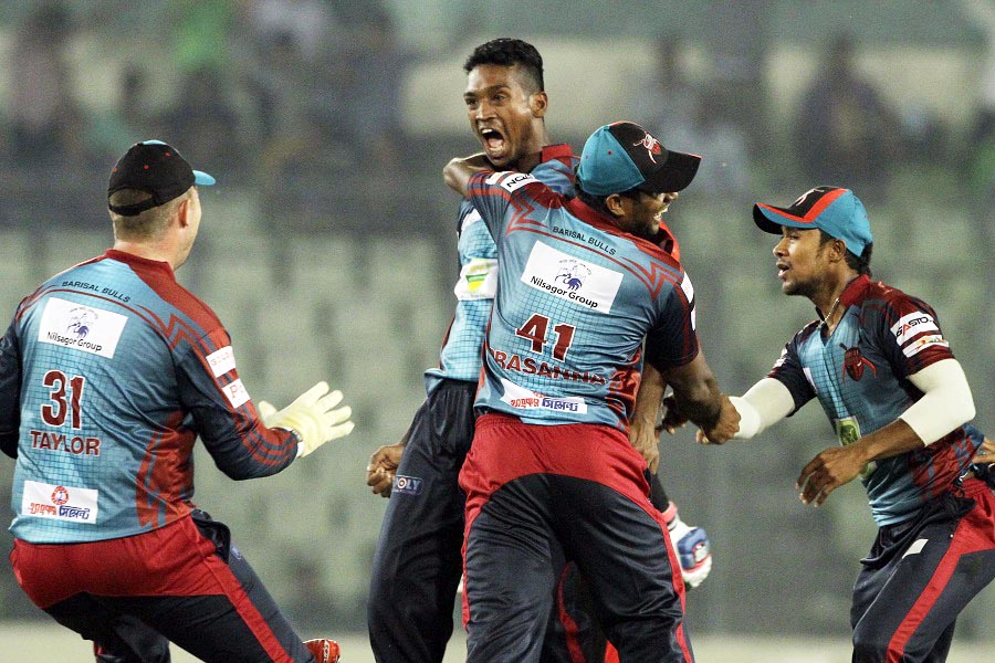 Al-Amin Hossain roars after taking a hat-trick during the Bangladesh Premier League cricket match between Sylhet Super Stars and Barisal Bulls at the Sher-e-Bangla National Cricket Stadium on Tuesday.