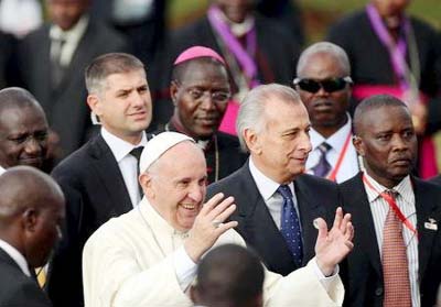 Pope Francis gestures as he arrives in Nairobi, Kenya on Wednesday.