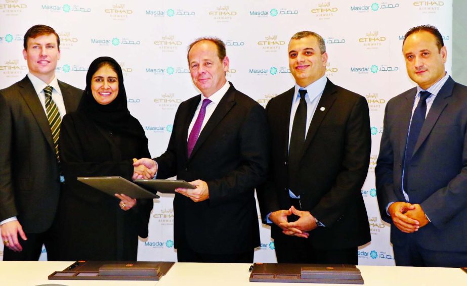 Chris Youlten, Senior Vice- President of Etihad Airways and Dr Behjat Al Yousuf of Interim Provost of Masdar Institute, exchanging the agreement papers at the first day of the UAE's Innovation Week 2015 recently.