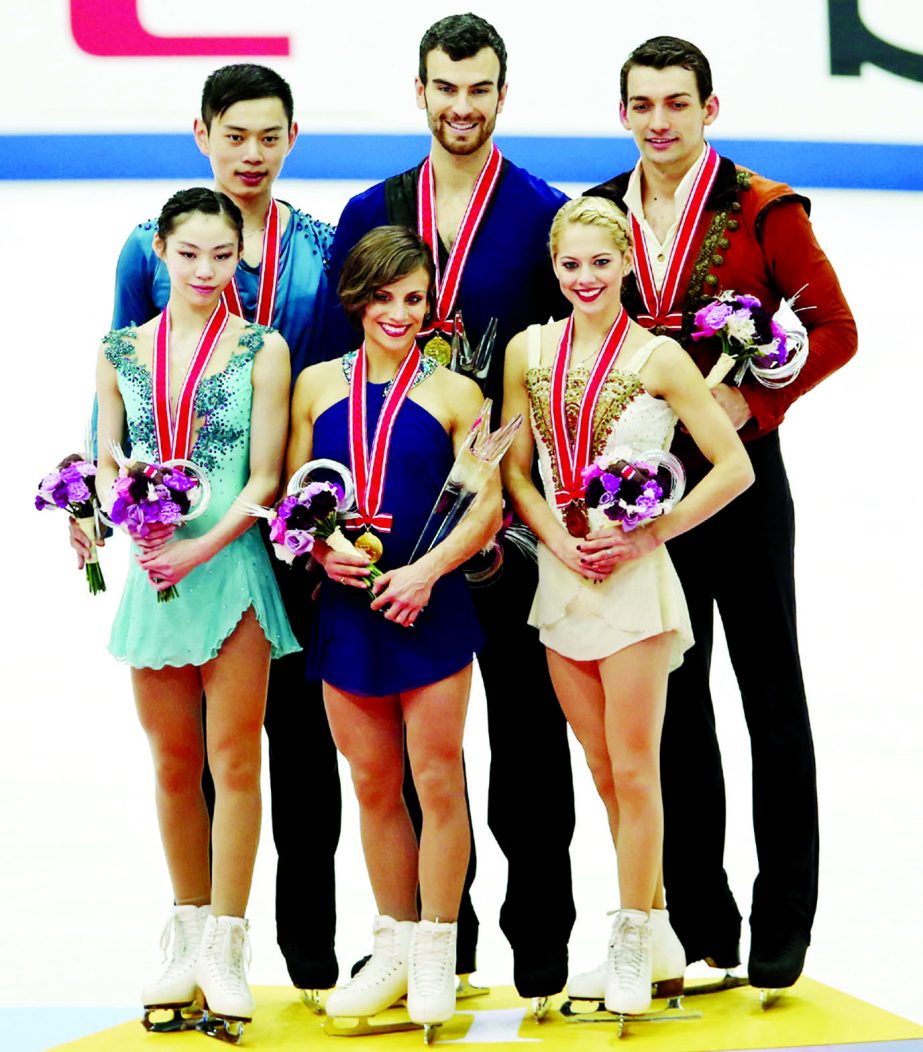 From left: Silver medallists Yu Xiaoyu and Jin Yang of China, gold medallists, Meagan Duhamel and Eric Radford of Canada and bronze medallists Alexa Scimeca and Chris Knierim of the United States pose for photo during an awarding ceremony of pair event at