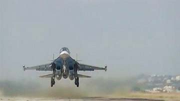 Photo shows a Russian military jet taking off at Hmeimim airbase in Syria.