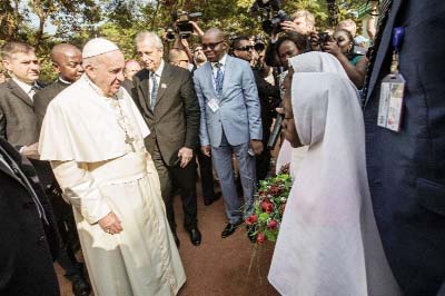 Pope Francis arrives at the Central Mosque in the Central African Republic's capital Bangui to meet with members of the Muslim community on Monday.