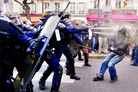 Demonstrators clash with CRS riot policemen near the Place de la Republique after the cancellation of a planned climate march following shootings in the French capital, ahead of the World Climate Change Conference 2015 (COP21), in Paris, France. Internet