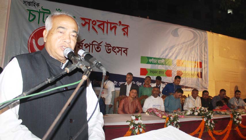 Housing and Public Works Minister Engr Mosharraf Hossain speaking as Chief Guest at a discussion meeting on the occasion of 3rd founding anniversary of the Weekly Chatgaer Sangbad in the city yesterday.