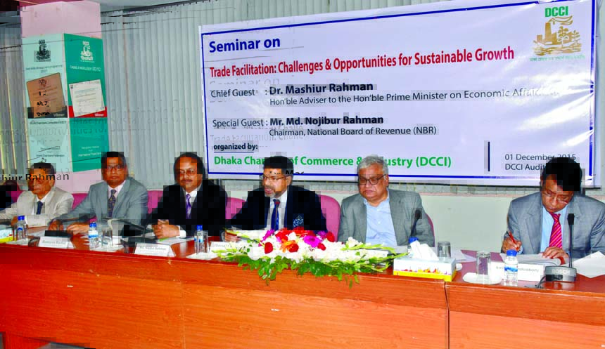 Dhaka Chamber of Commerce and Industry (DCCI) President Hossain Khaled speaking at a seminar on 'Trade Facilitation: opportunities and challenges for Sustainable Growth' in the conference room of DCCI in the city on Tuesday.