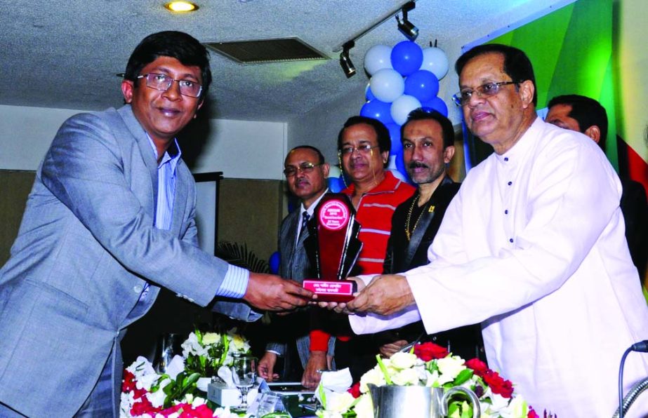 Chief Whip ASM Firoz is handing over the Agragami Award 2015 to young entrepreneur of Conten Technology Md Shamim Hossain at City Hotel recently.