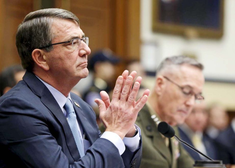 U.S. Defence Secretary Ash Carter (L) and Joint Chiefs Chairman Marine Corps Gen. Joseph Dunford Jr., testify before a House Armed Services Committee hearing on "US Strategy for Syria and Iraq and its Implications for the Region." in Washington on Tuesd