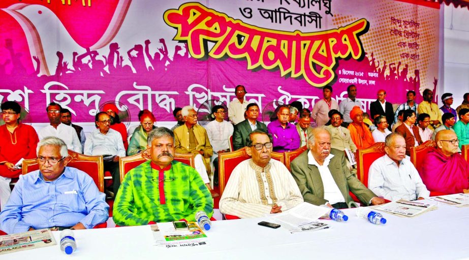 Awami League leader and former minister Suranjit Sengupta along with other distinguished persons at a grand rally organized by Bangladesh Hindu Bouddha Christian Oikya Parishad in the city's Suhrawardy Udyan on Friday to meet its various demands includin