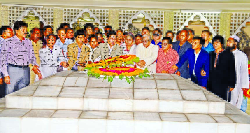 Different organisations including Awami League paying tributes to Huseyn Shaheed Suhrawardy by placing floral wreaths at the latter's Mazar in the city on Saturday marking his 52nd death anniversary.