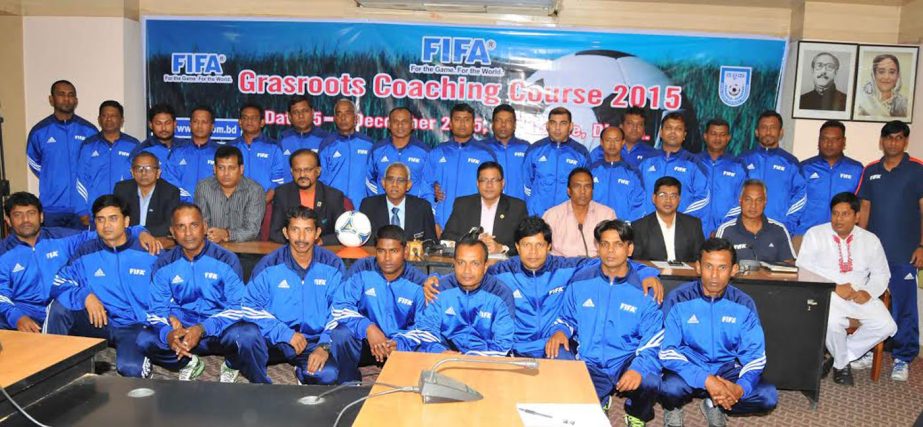 Participants of "Grassroot Coaching Course"" pose for photo with the organizer and guests at BFF Bhaban on Saturday."