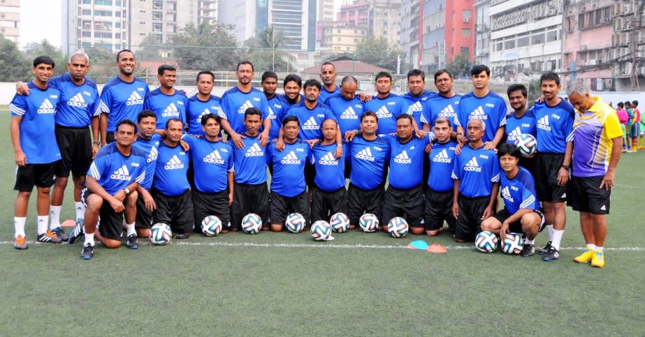 The participants of the FIFA Grassroots Coaching Course with the instructor pose for a photo session at the BFF Artificial Turf on Sunday.