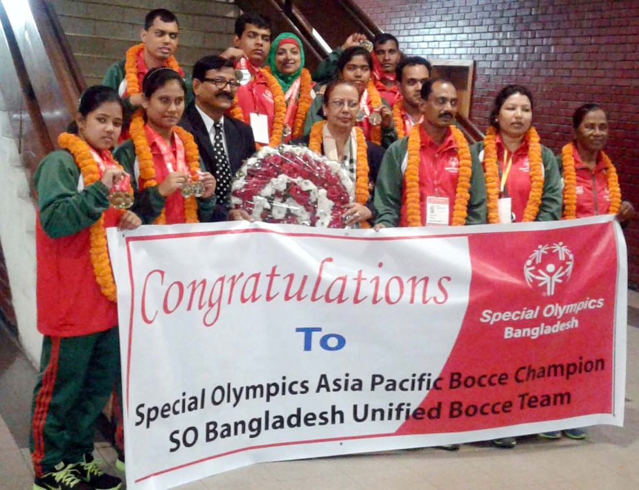 Members of Bangladesh Special Olympics Bocce team receiving floral wreaths from the officials of Bangladesh Special Olympics at the Hazrat Shahjalal International Airport on Monday night.