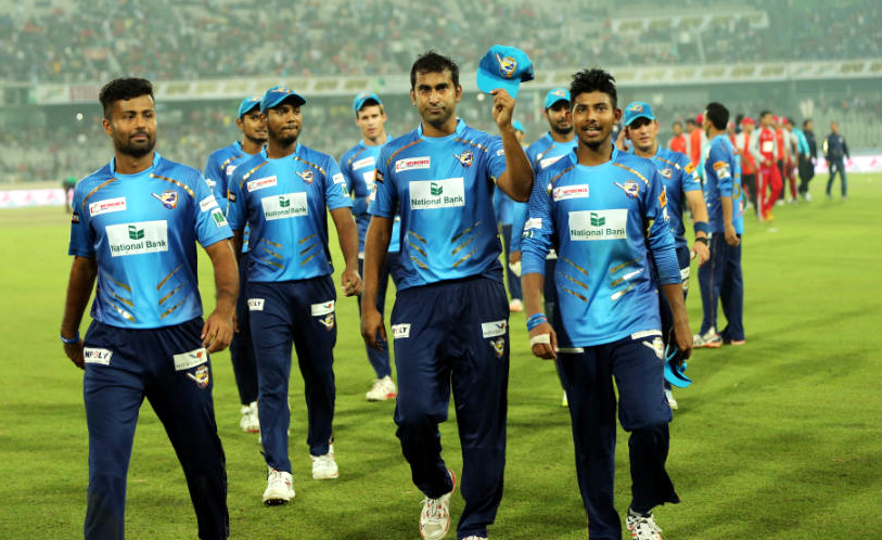 Mosharraf Hossain leads his team off the field after the 3rd Bangladesh Premier League match between Dhaka Dynamites and Chittagong Vikings at the Sher-e-Bangla National Cricket Stadium in Mirpur on Tuesday.