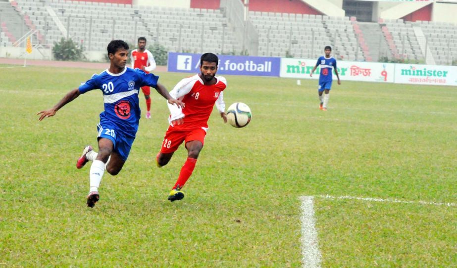 A moment of the football match of the Minister Fridge Bangladesh Championship League between Uttar Baridhara Club and Wari Club at the Bangabandhu National Stadium on Tuesday. The match ended in a goalless draw.