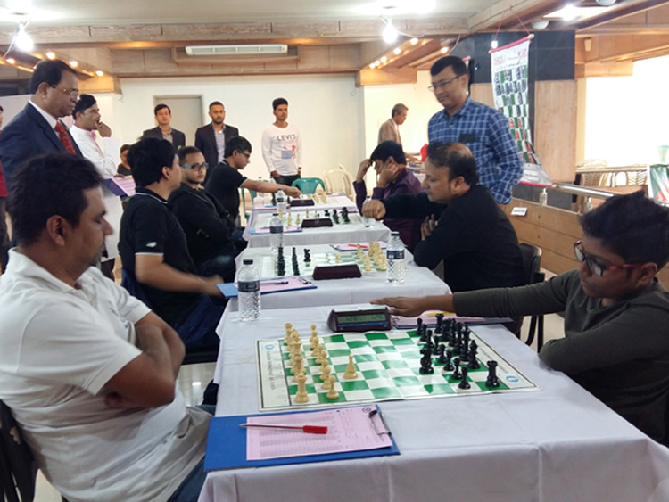 A scene from the 3rd round matches of the Walton Premier Division Chess League at the Bangladesh Chess Federation hall-room on Tuesday.