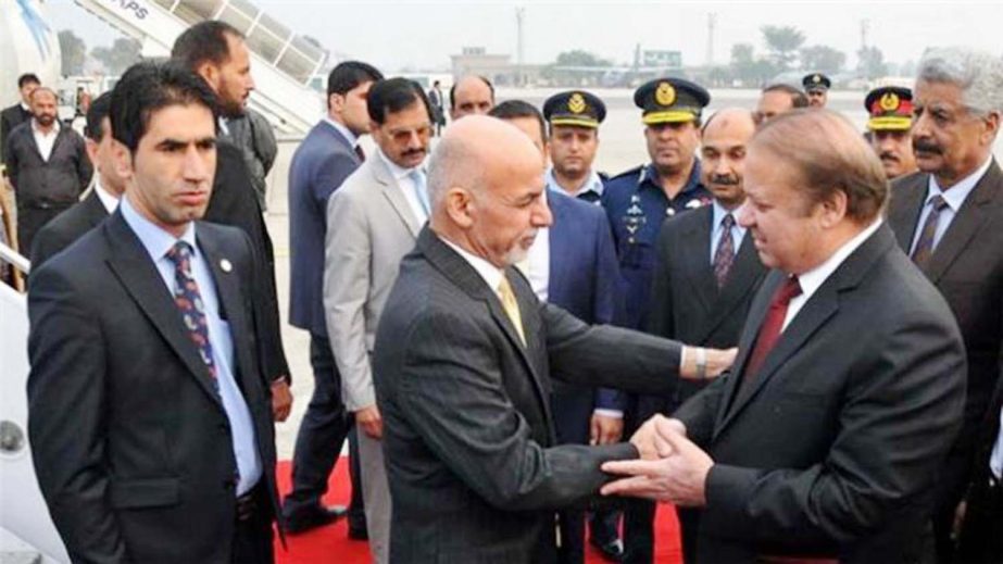 Pakistani Prime Minister Nawaz Sharif receiving Afghan President Ashraf Ghani, left, on his arrival at Nur Khan airbase in Rawalpindi, Pakistan, on Wednesday.