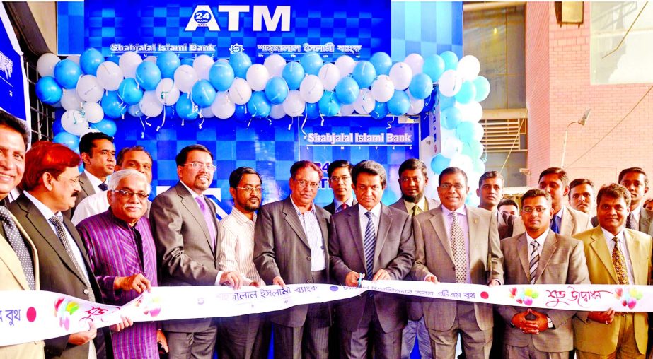 AK Azad, Chairman of the Board of Directors of Shahjalal Islami Bank Ltd, inaugurating its new ATM Booth at Channel Twenty four Babhan premises on Thursday.