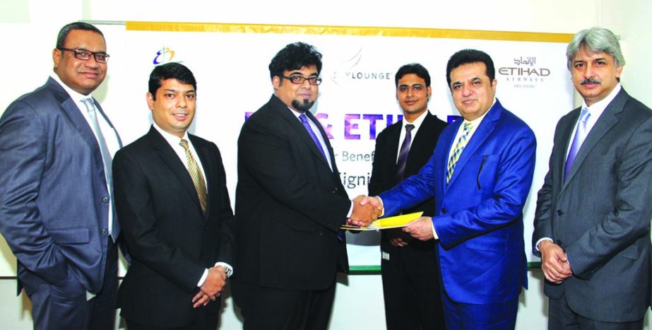 M Nazeem A Choudhury, head of consumer banking of Eastern Bank Limited and Hanif Zakaria, General Manager of Etihad Airways Bangladesh, sign an agreement in Dhaka recently. Under this agreement first class and business class passengers flying with the ai