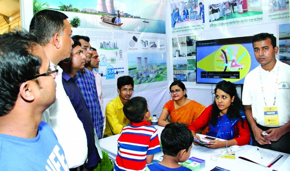Visitors taking various information on nuclear energy and Rooppur Nuclear Power Plant at "Energy Fair 2015"" organised by Bangladesh Atomic Energy Commission at BICC on Saturday."