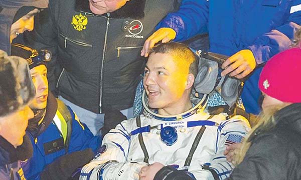 International Space Station crew member Kjell Lindgren of the US smile after landing in Dzhezkazgen , Kazakhstan on Friday.