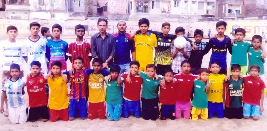 A football training camp began at the Sadek Hossain Khoka ground in the city recently. Photo shows the participants with the guests.
