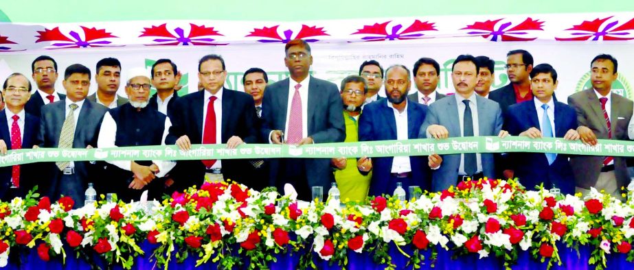 Kazi Sayedur Rahman, General Manager of Bangladesh Bank inaugurating new branches of National Bank Ltd. at Angaria in Shariatpur on Monday. Abdul Hamid Mia, Additional Managing Director and A S M Bulbul, Deputy Managing Director of the bank were present