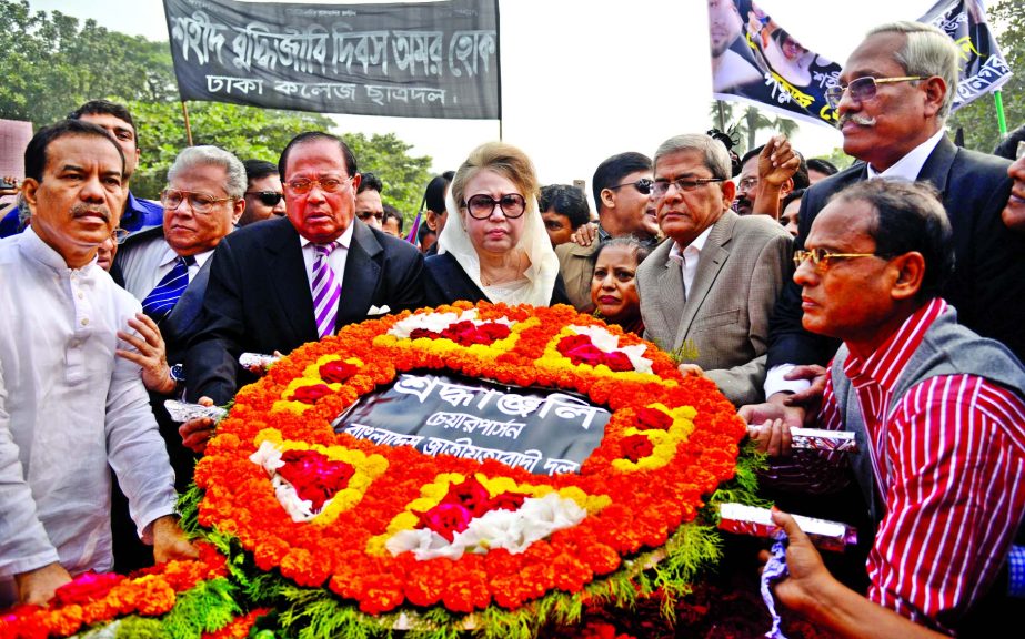 Marking the observance of Martyred Intellectuals Day BNP Chairperson Begum Khaleda Zia along with party leaders placing floral wreaths at the Intellectuals Memorial at Mirpur on Monday.