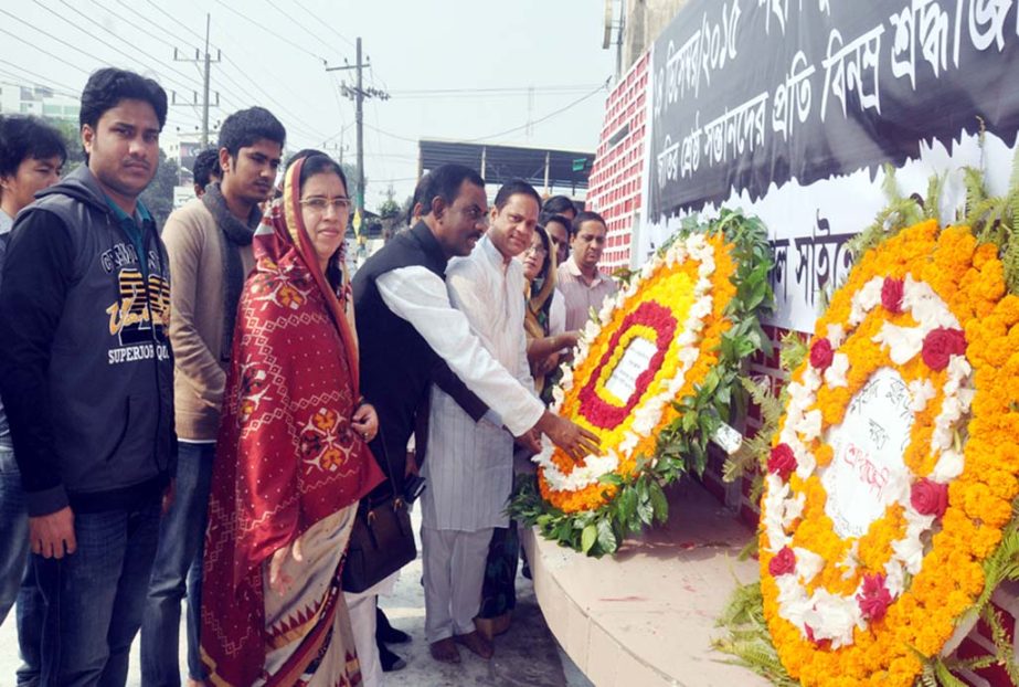 CCC Acting Mayor Chowdhury Hasan Mahmud Hasni along with others placing wreaths at the Martyred Intellectuals graveyard in Foy's Lake yesterday.